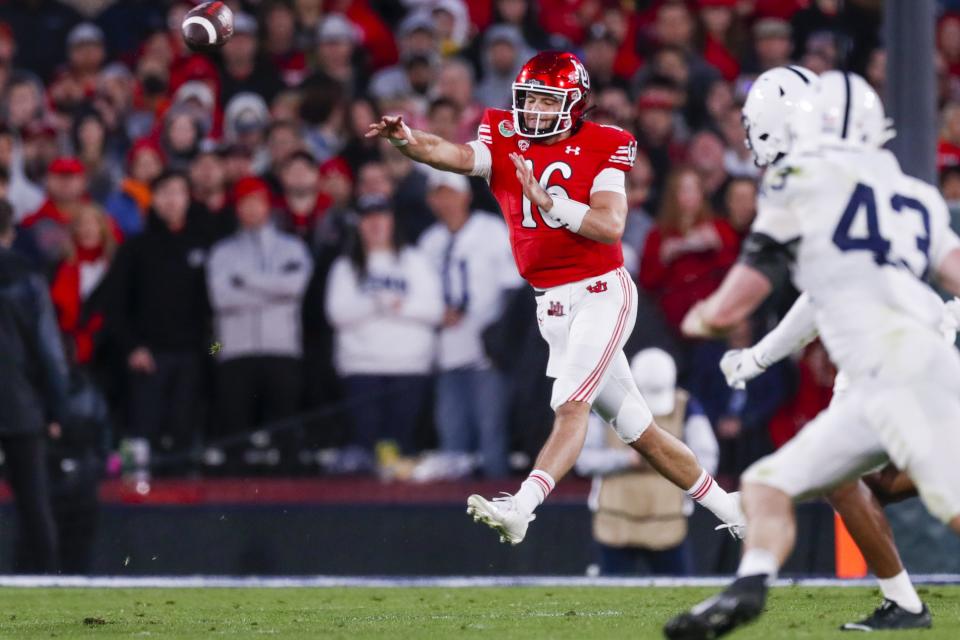 Utah Utes backup quarterback Bryson Barnes throws the ball.