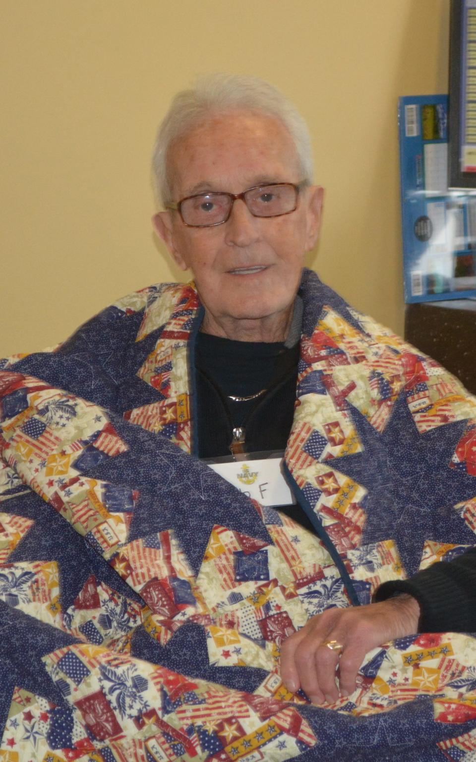 Robert Fullerton with his quilt.