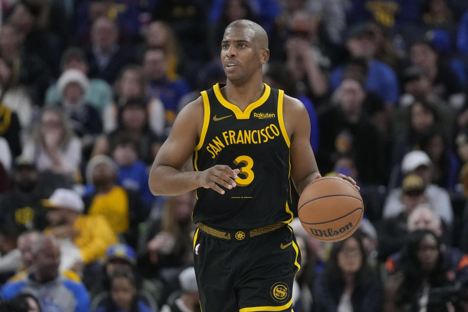 Golden State Warriors guard Chris Paul brings the ball up aagainst the Portland Trail Blazers during the second half of an NBA basketball game in San Francisco, Saturday, Dec. 23, 2023. (AP Photo/Jeff Chiu)