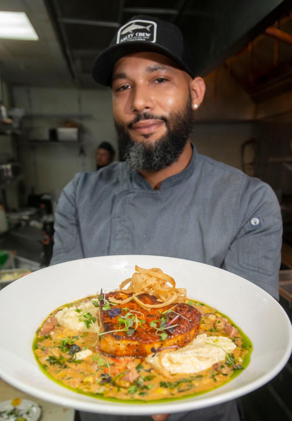 Grand Marlin Chef Ed Lorman presents his version of a Blackened Swordfish with grits on Thursday, May 26, 2022. Lordman recently competed on the new Food Network cooking show called Beachside Brawl.