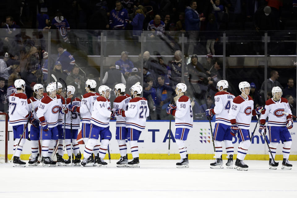 The Montreal Canadiens celebrate after defeating the New York Rangers in an NHL hockey game Sunday, Jan. 15, 2023, in New York. (AP Photo/Adam Hunger)