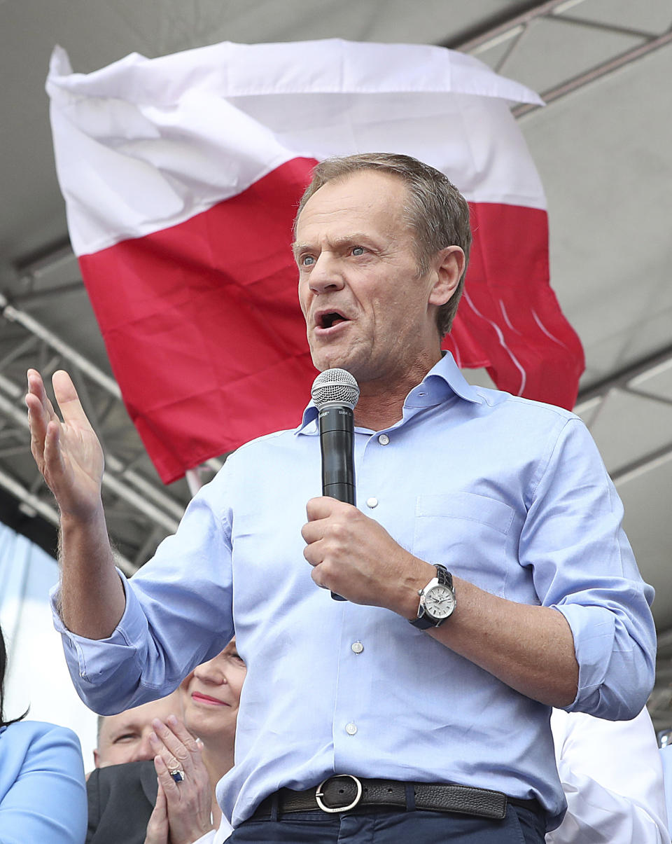 European Union Council President Donald Tusk leads a march celebrating Poland's 15 years in the EU and stressing the nation's attachment to the 28-member bloc ahead of May 26 key elections to the European Parliament, in Warsaw, Poland, Saturday, May 18, 2019. (AP Photo/Czarek Sokolowski)