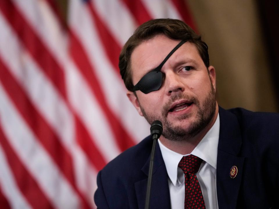 Republican Rep. Dan Crenshaw of Texas speaks during a meeting with House Republicans on August 30, 2021 in Washington, DC.