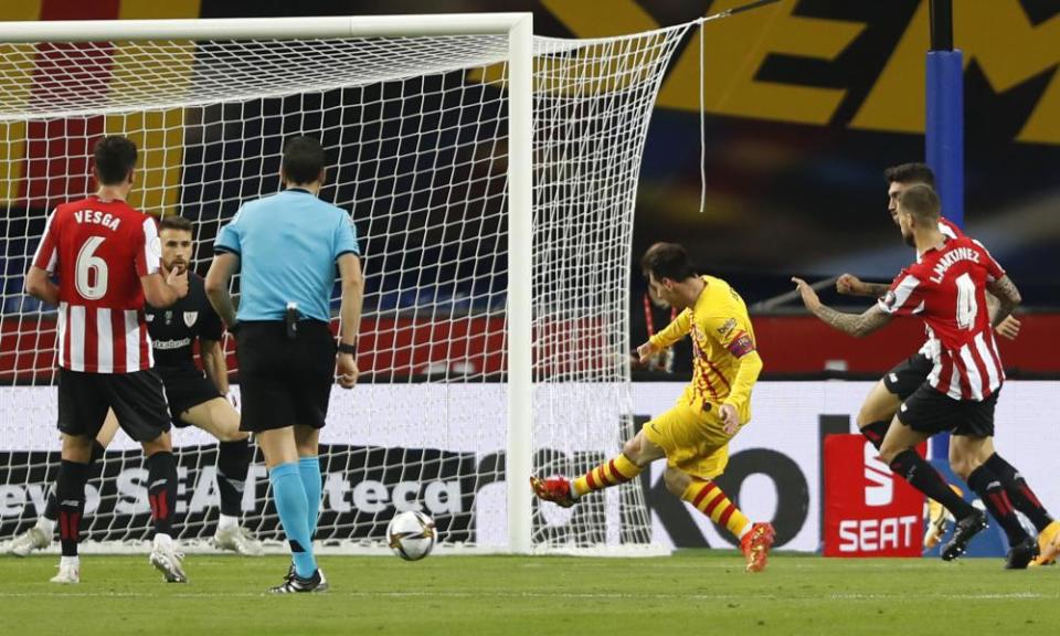 Lionel Messi scores Barcelona’s third goal on his way to a 35th trophy with the club.