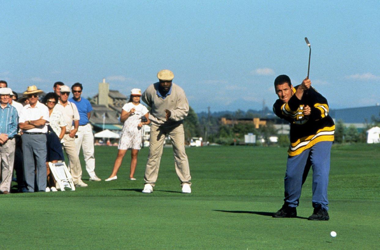 Carl Weathers and Adam Sandler in a scene from Happy Gilmore