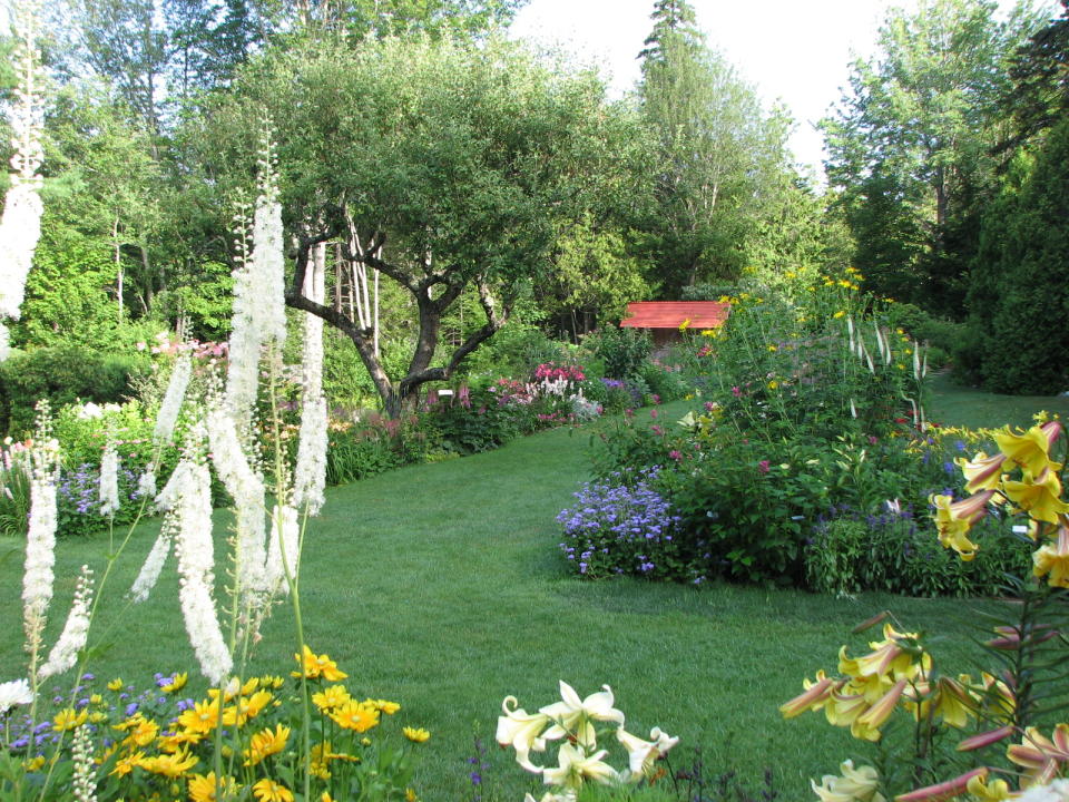 This 2010 photo provided by the Mount Desert Land & Garden Preserve shows colorful flowers at Thuya Garden in Northeast Harbor, Maine. Thuya’s collection includes plants from renowned landscape designer Beatrix Farrand, who created the nearby Abby Aldrich Rockefeller Garden, a privately owned garden that’s open to the public just a few days a year. (AP Photo/Mount Desert Land & Garden Preserve, Jason Ashur)