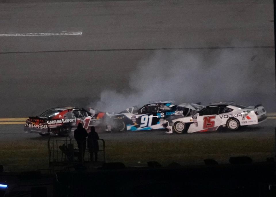 Hailie Deegan (15) is wiped out in a crash alongside Sam Mayer (1) and Kyle Weatherman (91) in the Xfinity Series United Rentals 300 on Monday, February 19, 2024 at Daytona International Speedway.