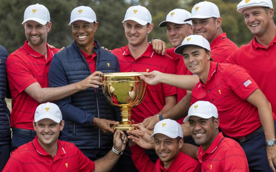 Woods capped off an incredible personal year, including Masters victory, to help the US win in Melbourne - AFP