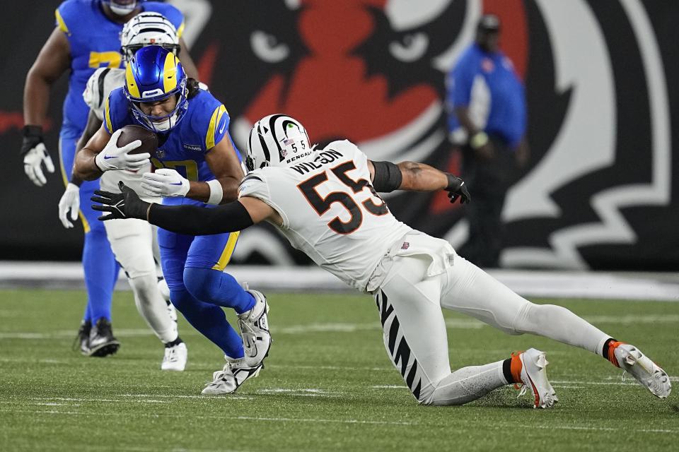 Los Angeles Rams wide receiver Puka Nacua, left, is stopped by Cincinnati Bengals linebacker Logan Wilson (55) during the first half of an NFL football game Monday, Sept. 25, 2023, in Cincinnati. | Darron Cummings, Associated Press