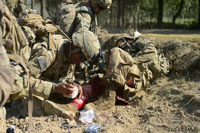 The use of body armor to protect against blast injuries has led Western and Afghan armies to teach first aid for head and extremity wounds