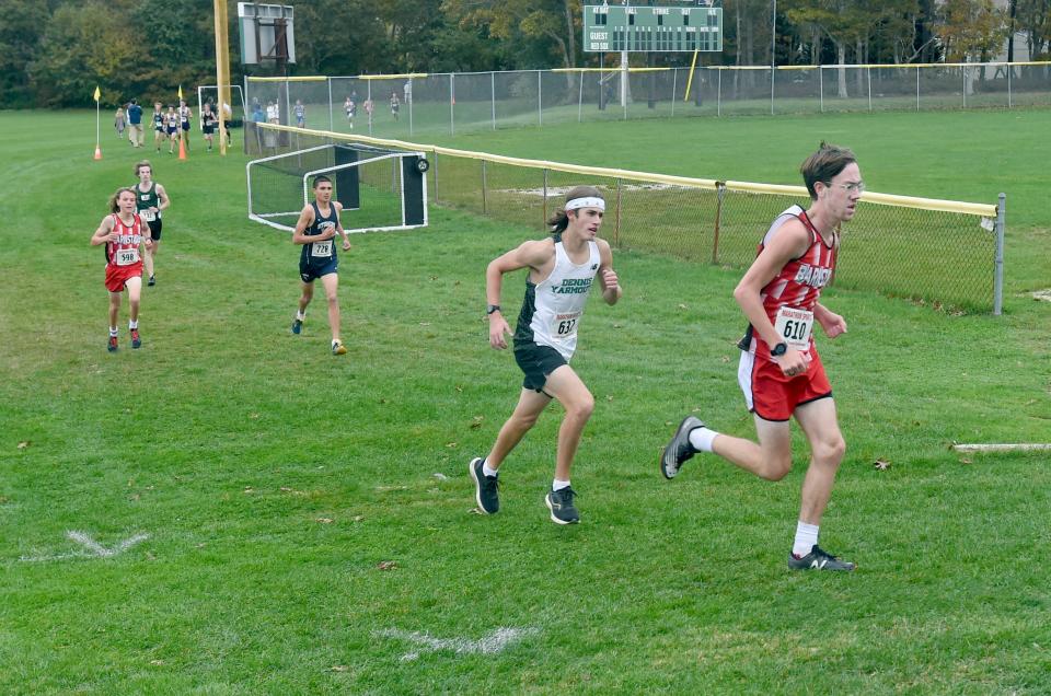 SOUTH YARMOUTH  11/02/21  Jaxson Merrill of Barnstable leads his group going up the hill to the final half lap before the finish of the Cape and Islands Cross Country Championship at Dennis-Yarmouth high school.