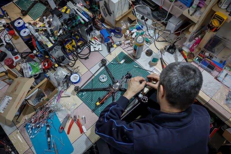 Ukrainian serviceman fixes an FPV drone in Donetsk region