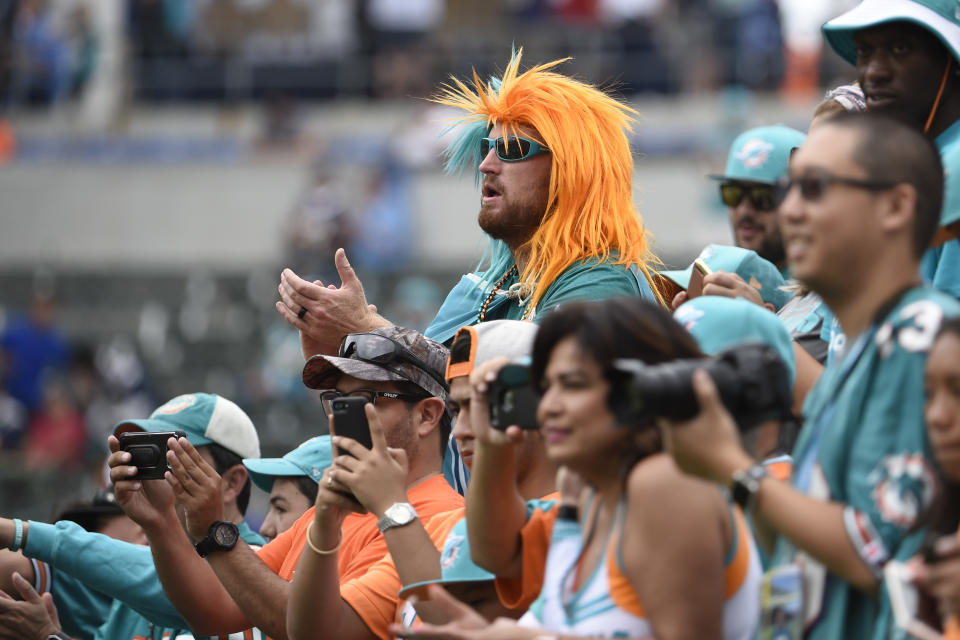 Fans for the Miami Dolphins look on before the Dolphins played the Chargers in the Chargers' first game in Los Angeles after their move. (AP)