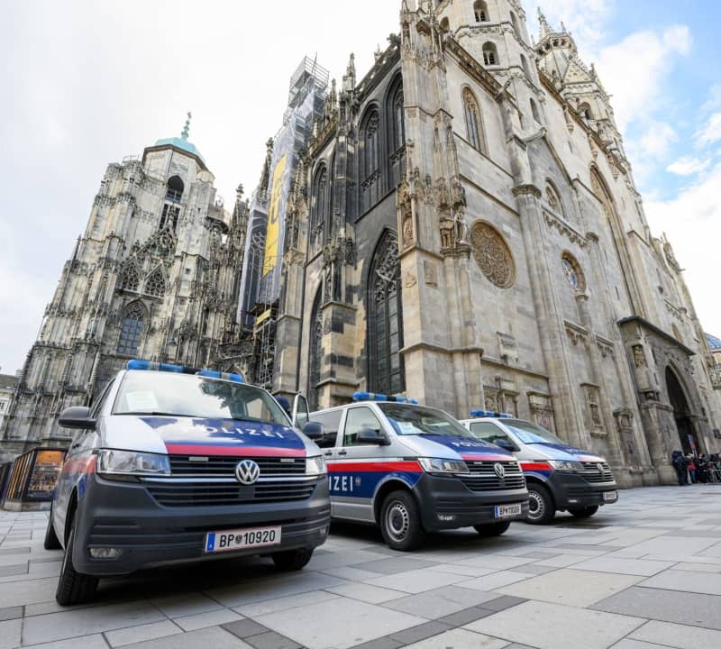 Police cars stand in front of St. Stephen's Cathedral following indications of a possible attack plan by a terrorist group. According to the Austrian Ministry of the Interior, the Austrian Office for the Protection of the Constitution has arrested four people in an investigation into a terrorist network. Max Slovencik/APA/dpa