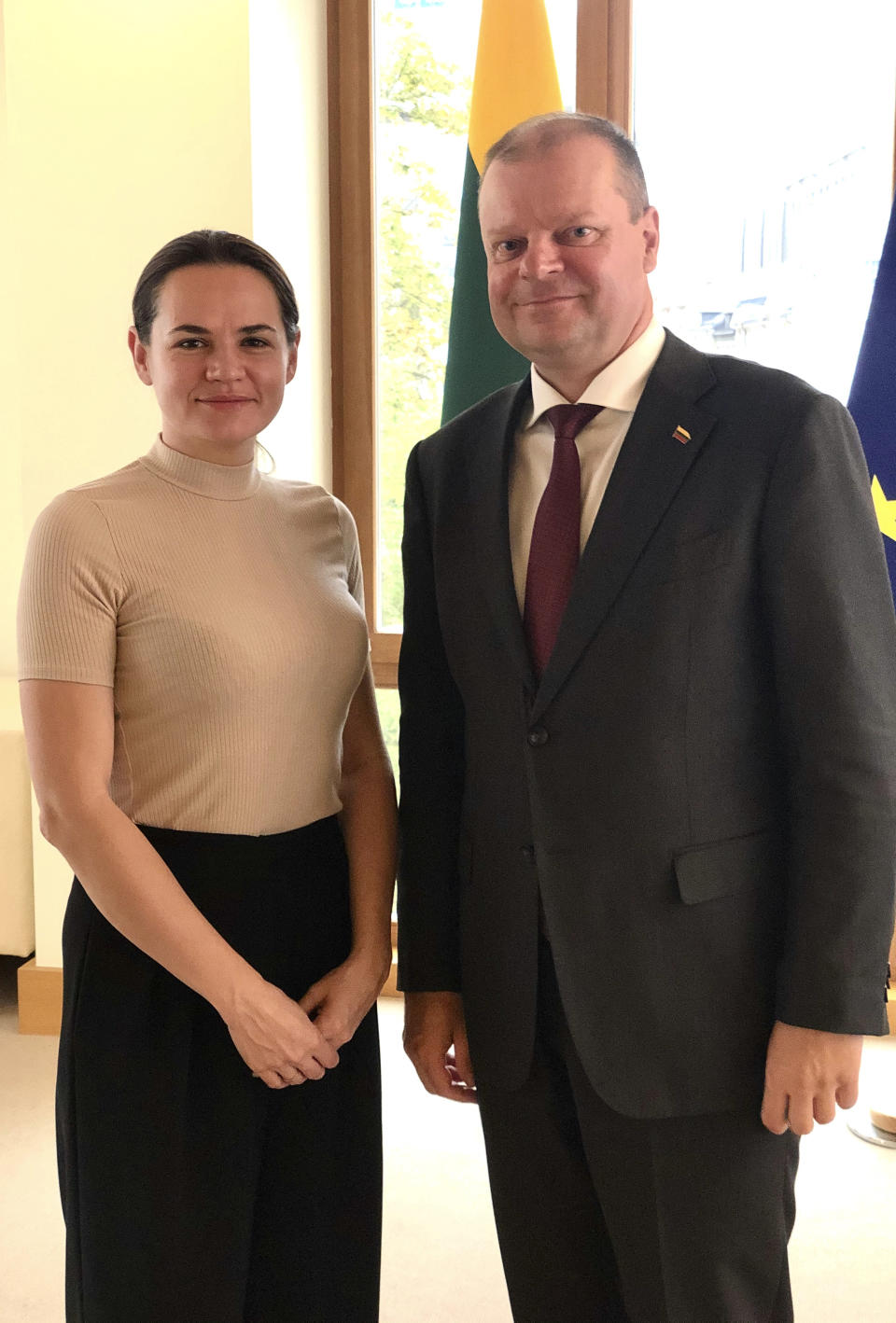 Belarusian opposition candidate Svetlana Tikhanovskaya, left, meets with Lithuanian Prime Minister Saulius Skvernelis, in Vilnius, Lithuania, Thursday Aug. 20, 2020. Tikhanovskaya fled from Belarus following the disputed Aug. 9, presidential election, that forced her into exile, although Lithuania's Skvernelis has declared she has the backing of the Baltic countries.(Lithuanian Prime Minister's Office via AP)