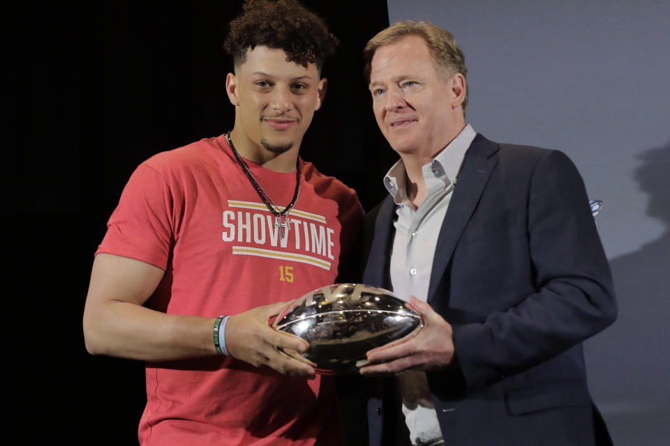 Patrick Mahomes shows off the spoils of victory, that included the Super Bowl MVP trophy, with commissioner Roger Goodell. Months later, Mahomes had a pointed message for Goodell. (AP Photo/Brynn Anderson, File)