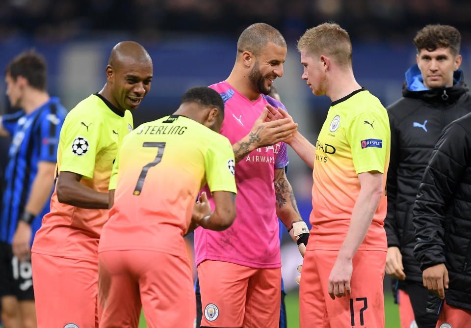 MILAN, ITALY - NOVEMBER 06: Kyle Walker of Manchester City has a laugh with Kevin De Bruyne, Raheem Sterling and Fernandinho of Manchester City following the UEFA Champions League group C match between Atalanta and Manchester City at Stadio Giuseppe Meazza on November 06, 2019 in Milan, Italy. (Photo by Michael Regan/Getty Images)