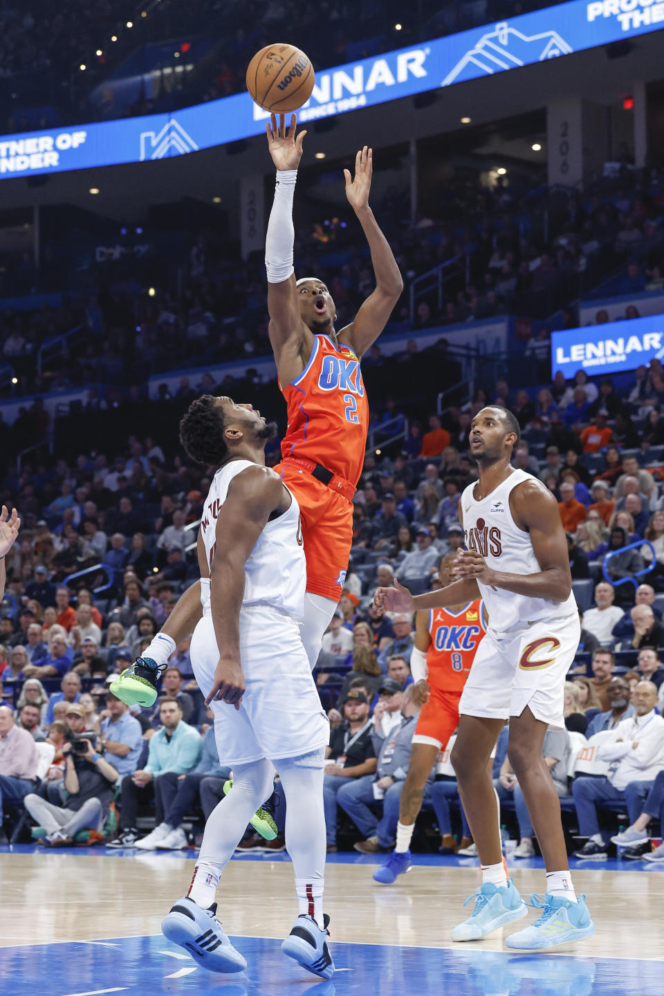 Nov 8, 2023; Oklahoma City, Oklahoma, USA; Oklahoma City Thunder guard Shai Gilgeous-Alexander (2) shoots over Cleveland Cavaliers guard Donovan Mitchell (45) during the second half at Paycom Center. Oklahoma City won 128-120. Mandatory Credit: Alonzo Adams-USA TODAY Sports