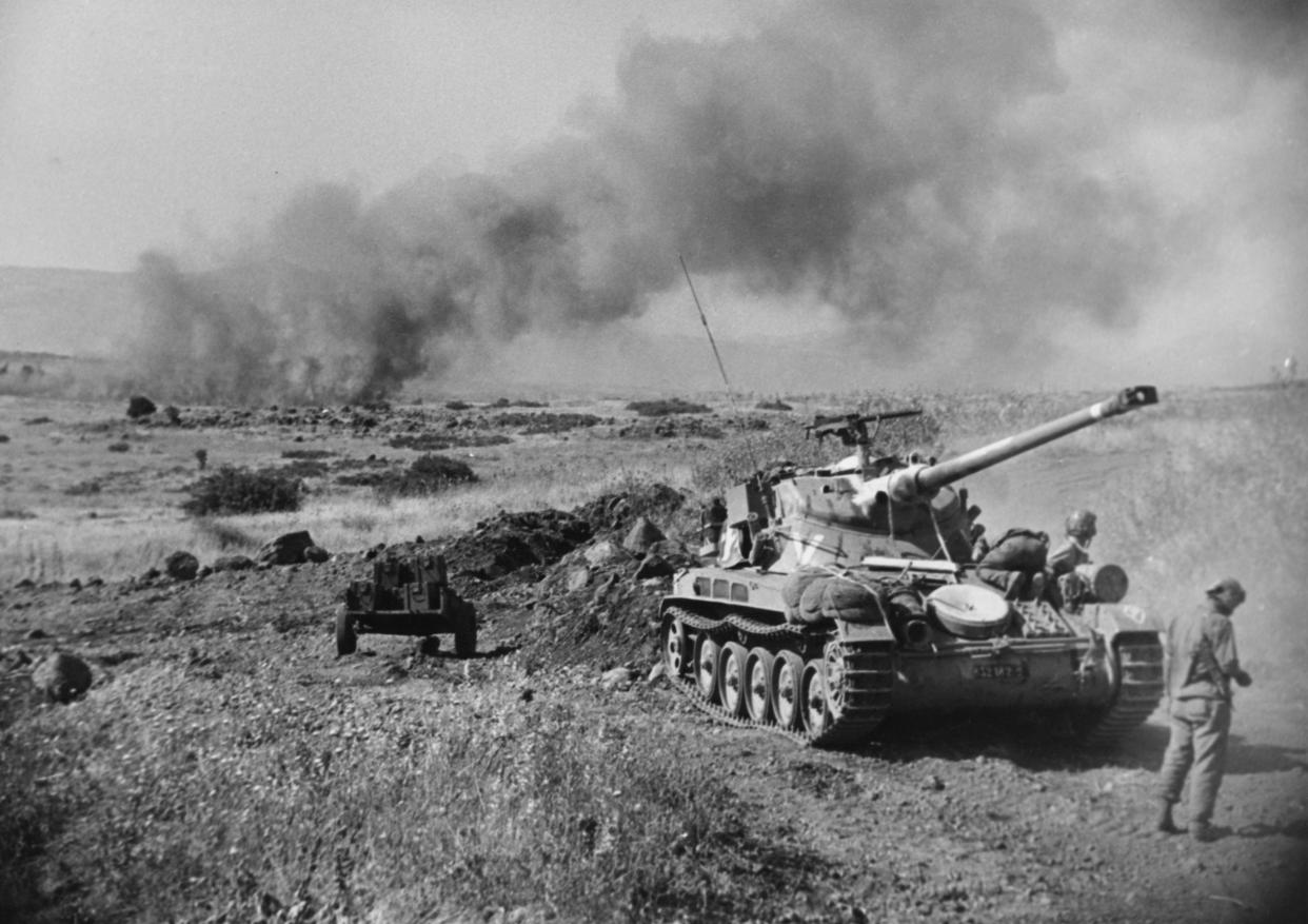 Israeli forces advancing in the Sinai desert during the Six-Day War, June 1967. (Central Press/Hulton Archive/Getty Images)