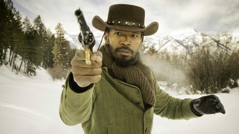 Jamie Foxx holding pistol in Django Unchained