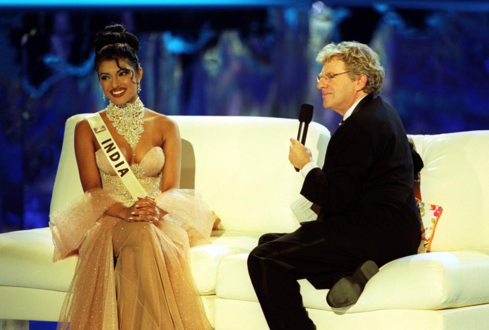 Miss India, Priyanka Chopra, 18, speaking with the host, Jerry Springer, during the Miss World contest at The Millennium Dome in Greenwich.   (Photo by Michael Crabtree - PA Images/PA Images via Getty Images)