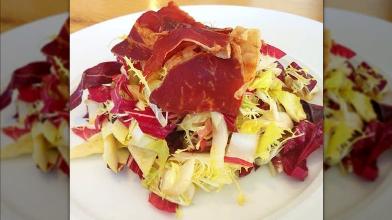 endive salad with prosciutto chips