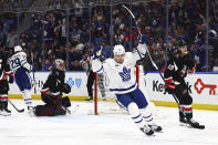 Toronto Maple Leafs left wing Matthew Knies (23) celebrates a goal by left wing Nicholas Robertson (89) during the second period of an NHL hockey game against the Buffalo Sabres, Saturday, March 30, 2024, in Buffalo, N.Y. (AP Photo/Jeffrey T. Barnes)