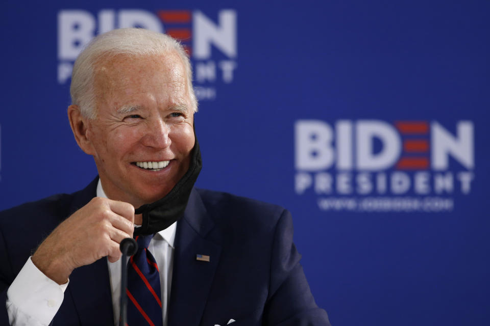 FILE - In this June 11, 2020, file photo Democratic presidential candidate former Vice President Joe Biden smiles while speaking during a roundtable on economic reopening with community members in Philadelphia. (AP Photo/Matt Slocum, File)