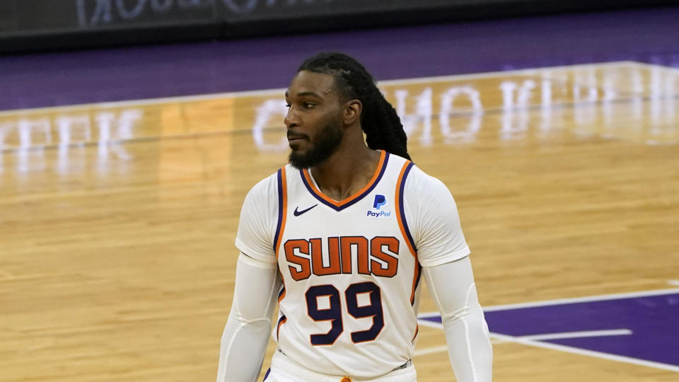 Phoenix Suns forward Jae Crowder, center, during the second half of an NBA basketball game against the Sacramento Kings in Sacramento, Calif., Saturday, Dec. 26, 2020. The Kings won 106-103. (AP Photo/Rich Pedroncelli)