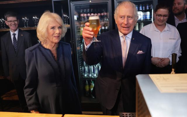 Charles and Camilla make a toast to a successful tour - Chris Jackson/Getty Images