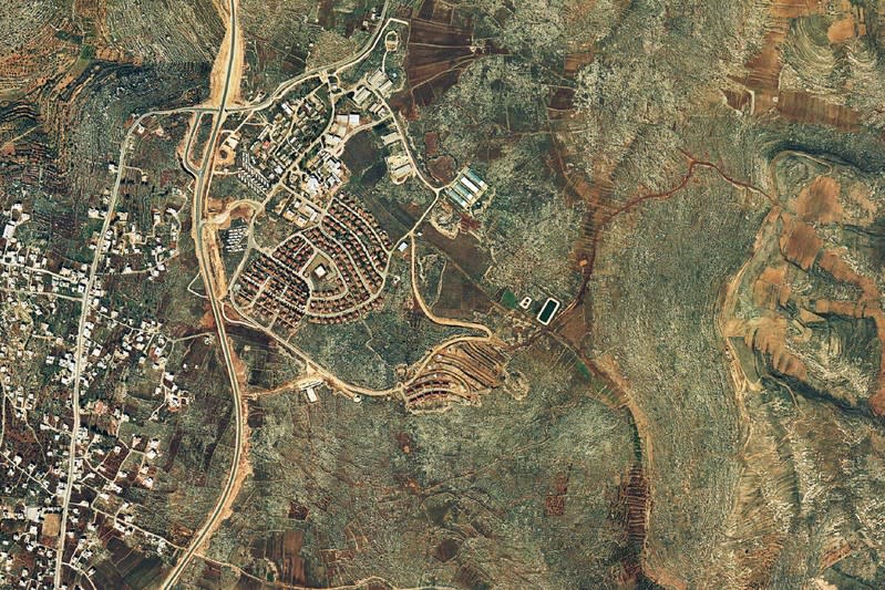 FILE PHOTO: An aerial view shows the Israeli settlement of Ofra in the occupied West Bank as seen in 1997 and obtained by Reuters from "Peace Now\