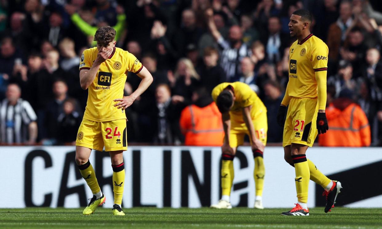 <span>Sheffield United players look deflated after Callum Wilson’s strike to make it 5-1.</span><span>Photograph: Scott Heppell/Reuters</span>