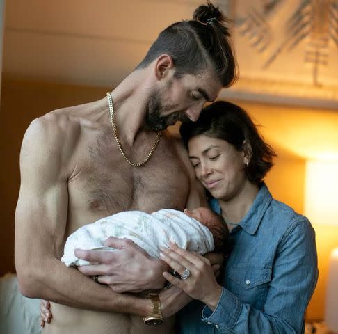 <p><a href="https://www.instagram.com/boonestudios/" data-component="link" data-source="inlineLink" data-type="externalLink" data-ordinal="1">Boone Studios</a></p> Michael and Nicole Phelps with their new baby