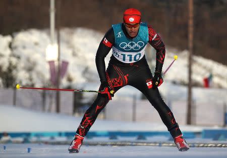 Cross-Country Skiing – Pyeongchang 2018 Winter Olympics – Men's 15km Free – Alpensia Cross-Country Skiing Centre – Pyeongchang, South Korea – February 16, 2018 - Pita Taufatofua of Tonga reacts. REUTERS/Carlos Barria