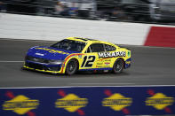 Ryan Blaney (12) drives into Turn 3 during the NASCAR All-Star auto race at North Wilkesboro Speedway in North Wilkesboro, N.C., Sunday, May 19, 2024. (AP Photo/Chuck Burton)