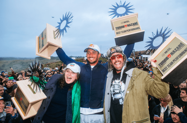 Brazilian sweep at the TUDOR Nazaré Big Wave Challenge with Maya Gabeira (left), Lucas "Chumbo" Chianca (middle), and Pedro Scooby (right) collecting their hardware.<p>Photo by Damien Poullenot/World Surf League</p>