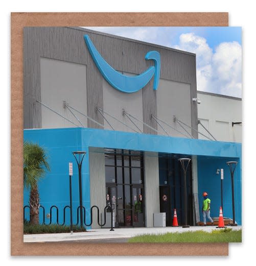 A construction worker can be seen in front of the entrance to the new Amazon distribution center in Deltona on Wednesday, Sept. 2, 2020.