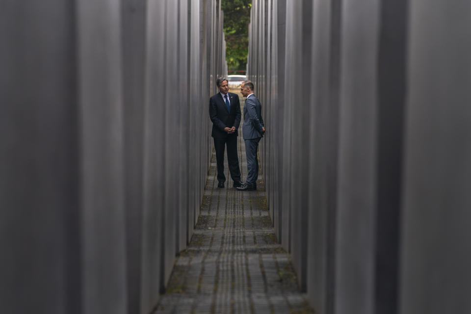 U.S. Secretary of State Antony Blinken, left, and German Minister of Foreign Affairs Heiko Maas, right, speak together as they walk through the Memorial to the Murdered Jews of Europe following a ceremony for the launch of a U.S.-Germany Dialogue on Holocaust Issues in Berlin, Thursday, June 24, 2021. Blinken is on a week long trip in Europe traveling to Germany, France and Italy. (AP Photo/Andrew Harnik, Pool)