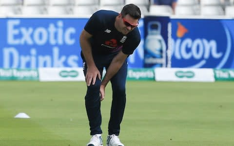 England's James Anderson stretches before play on the second day of the first Ashes cricket Test match between England and Australia at Edgbaston in Birmingham, central England on August 2, 2019 - Credit: Getty Images