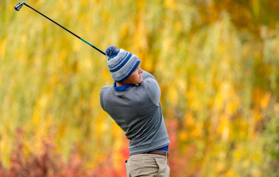 Saint Joseph’s Catholic Academy’s Tim Peters tees off for the third hole during the PIAA golf championships on Monday, Oct. 17, at the Penn State Golf Courses.