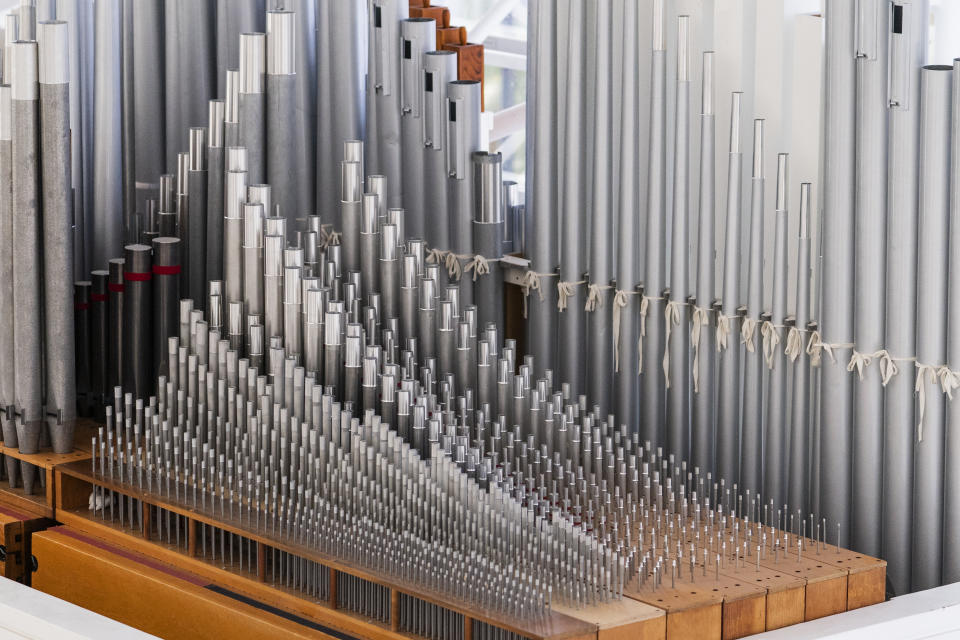 The Hazel Wright organ restored pipes are seen at Christ Cathedral in Garden Grove, Calif., Tuesday, Feb. 15, 2022. The organ, named after its original benefactor, now has 17,000 pipes, 15 divisions and 293 ranks. After extensive repairs in Padua, Italy, the pieces were shipped back to Orange County where they sat in a temperature-controlled storage facility for four years. (AP Photo/Damian Dovarganes)