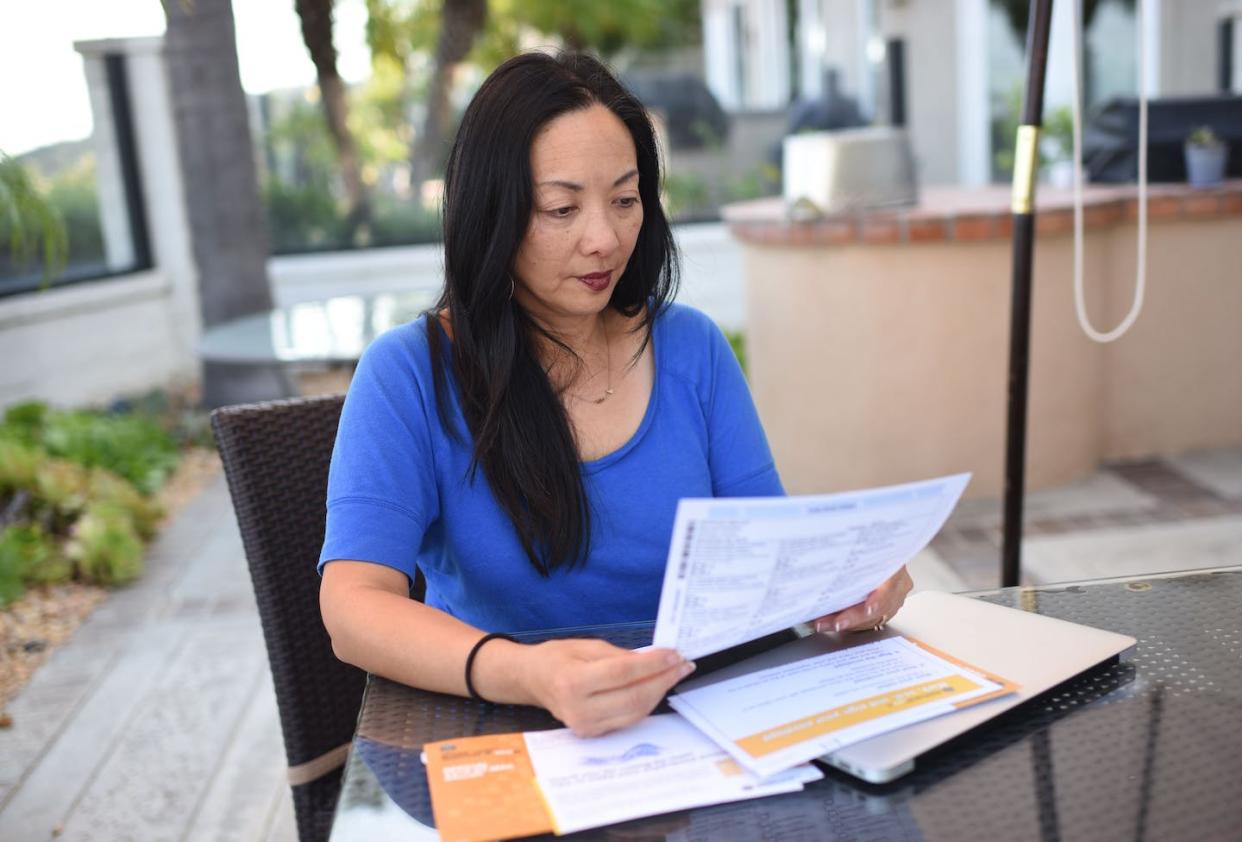 Voting at home by mail can be very convenient – and safe from concerns about COVID-19. <a href="https://www.gettyimages.com/detail/news-photo/engineer-katherine-amoukhteh-looks-over-her-mail-in-ballot-news-photo/1052560438" rel="nofollow noopener" target="_blank" data-ylk="slk:Robyn Beck/AFP via Getty Images;elm:context_link;itc:0;sec:content-canvas" class="link ">Robyn Beck/AFP via Getty Images</a>