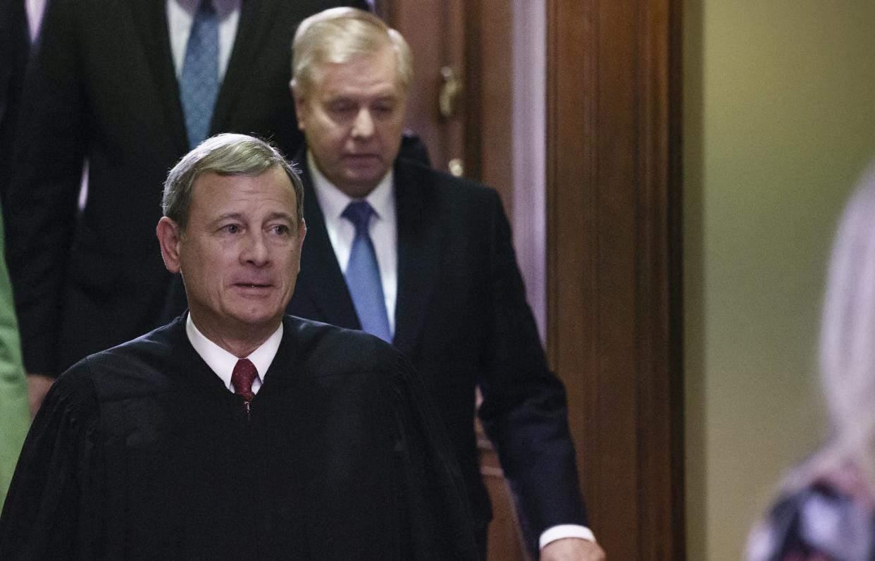 <span class="caption">Chief Justice John Roberts is shown leaving the Senate chamber during President Trump's impeachment trial Feb. 5, 2020. Behind him is Lindsay Graham, (R-S.C).</span> <span class="attribution"><a class="link " href="http://www.apimages.com/metadata/Index/Trump-Impeachment/42559685d3d44dc98a7b8cf101185a1d/6/0" rel="nofollow noopener" target="_blank" data-ylk="slk:J. Scott Applewhite/AP Photo;elm:context_link;itc:0;sec:content-canvas">J. Scott Applewhite/AP Photo</a></span>