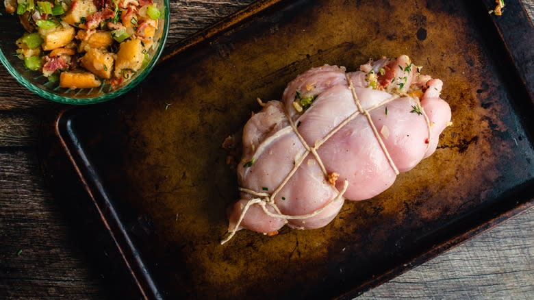 butcher's twine trussing a raw turkey