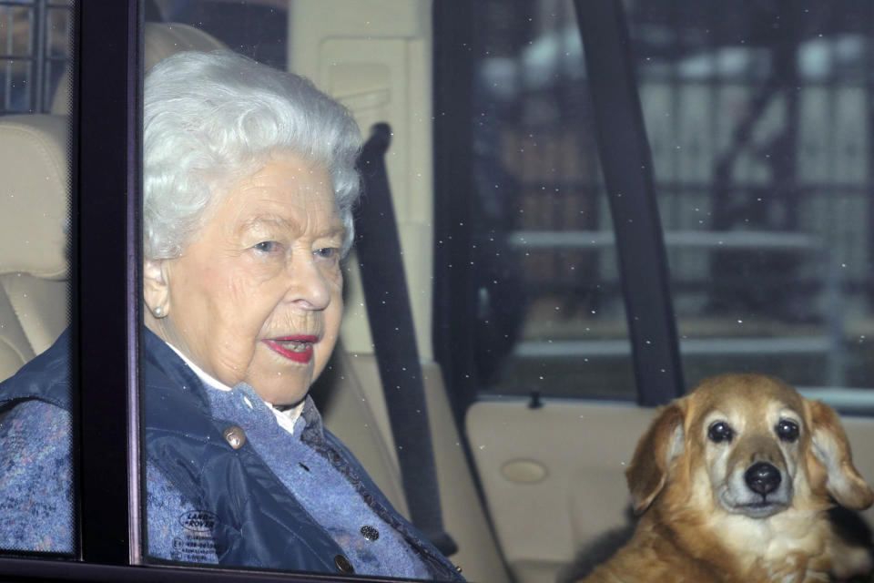 Britain's Queen Elizabeth leaves Buckingham Palace for Windsor Castle to socially distance herself amid the coronavirus pandemic, in London, Thursday, March 19, 2020. She is heading to her Berkshire home a week earlier than she normally would at this time of year, and is expected to remain there beyond the Easter period. For some people the new COVID-19 coronavirus causes only mild or moderate symptoms, but for some it can cause severe illness.  (Aaron Chown/PA via AP)