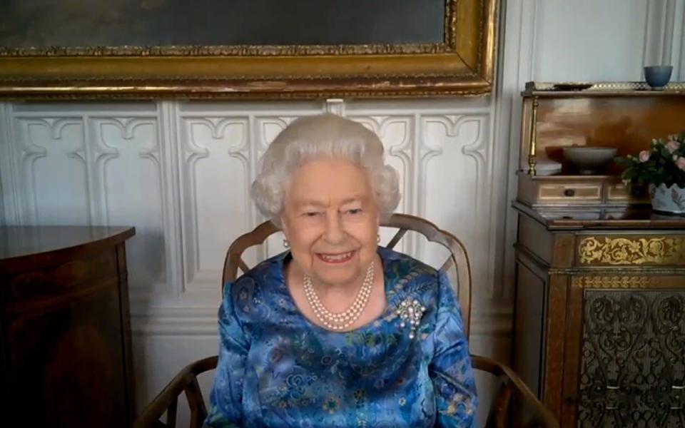 The Queen conducted the meeting via a video call from Windsor Castle - PA