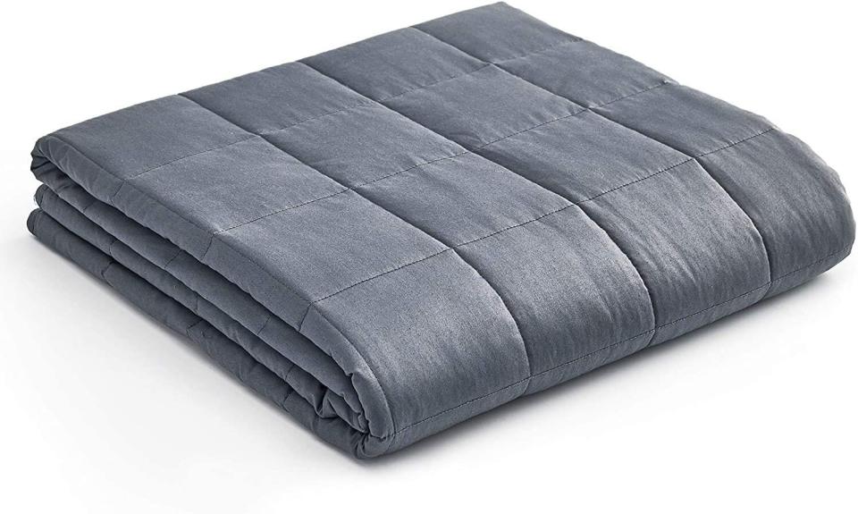 If your kiddo has a weighted blanket on their wish list, this one is meant for a twin or full-sized bed. This weighted blanket has over 22,000 reviews. <a href="https://amzn.to/2H5DV2p" target="_blank" rel="noopener noreferrer">Originally $80, get it now for $50 at Amazon</a>.