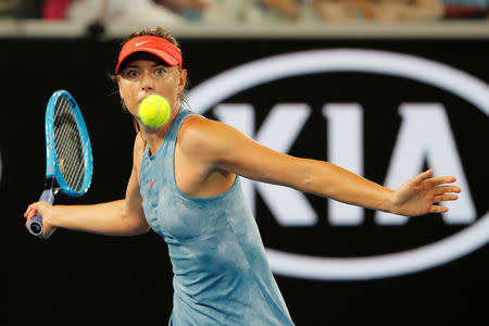 Tennis - Australian Open - Second Round - Melbourne Park, Melbourne, Australia, January 16, 2019. Russia's Maria Sharapova in action during the match against Sweden's Rebecca Peterson. REUTERS/Adnan Abidi