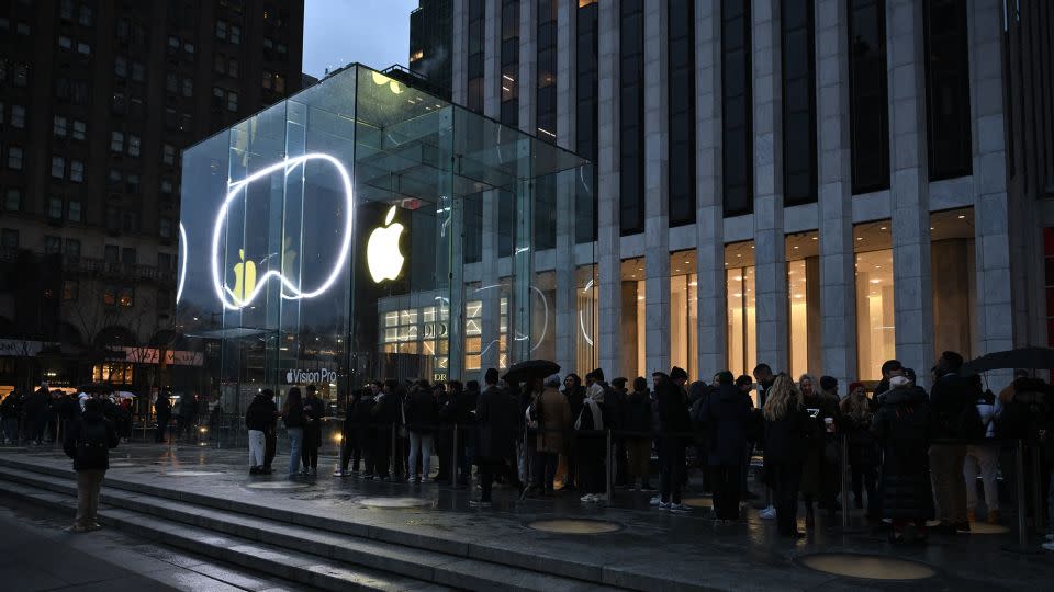 People line up outside the New York Apple Store on February 2, 2024, as the Vision Pro headset is released in US Apple stores. The Vision Pro, the tech giant's $3,499 headset, is its first major release since the Apple Watch nine years ago. - Angela Weiss/AFP/Getty Images