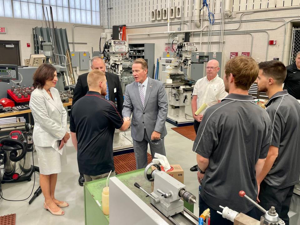 Lt. Gov. Jon Husted talks with Stark State College students Thursday morning about training they received in the W.R. Timken Advanced Manufacturing Lab. Husted also discussed workforce need during a roundtable with area business leaders. (Photo courtesy Stark State)